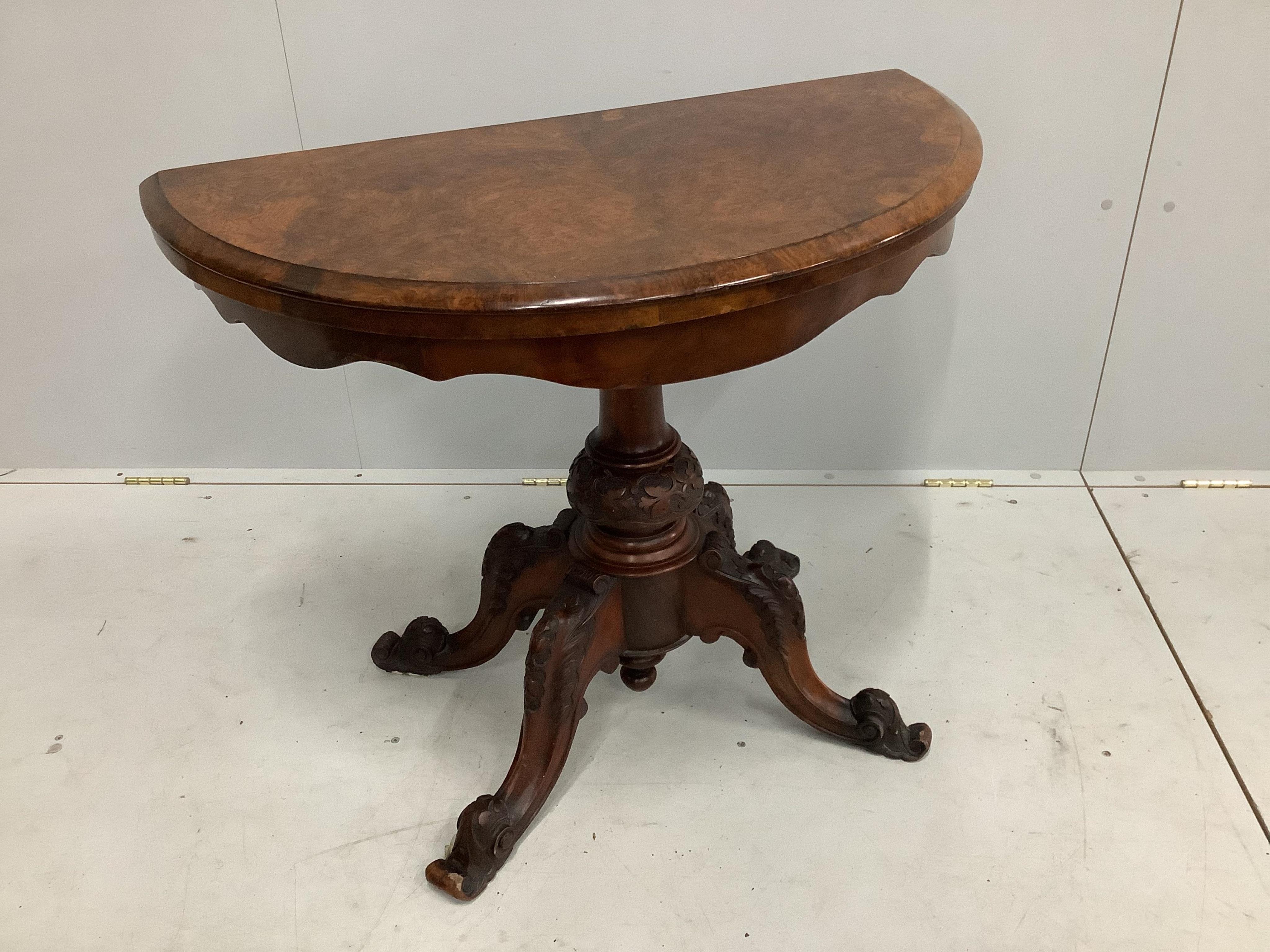 A Victorian figured walnut D shaped folding card table, width 90cm, depth 49cm, height 69cm